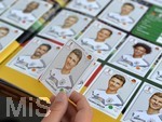 17.06.2018, Panini-Sammelalbum zur Fussball WM-2018 in Russland,  Der kleine DFB-Fan Lars Schssler aus Mindelheim (Bayern) klebt begeistert die Klebebildchen ins Panini-Sammelheft. (Modelreleased!) 