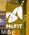 12.04.2024, FIBO-Messe fr Fitness, Wellness und Gesundheit in Kln. Logo von McFIT am Messestand von ALDI SPORTS.