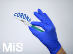 30.03.2020, Symbolbild: Impfung gegen die Corona-Viren