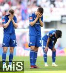 27.05.2023, Fussball 1. Bundesliga 2022/2023, 34. Spieltag, RB Leipzig - FC Schalke 04, in der Red Bull Arena Leipzig. der FC Schalke 04 steigt aus der Bundesliga ab, (L-R) Tobias Mohr (Schalke 04), Marcin Kaminski (Schalke 04) und Danny Latza (Schalke 04) nach Abpfiff enttuscht


