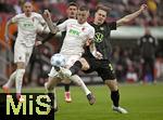 15.03.2025, Fussball 1. Bundesliga 2024/2025, 26. Spieltag, FC Augsburg - VfL Wolfsburg, in der WWK-Arena Augsburg, v.li: Jeffrey Gouweleeuw (FC Augsburg) gegen Matthias Svanberg (Wolfsburg) 
 

