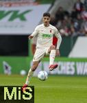15.03.2025, Fussball 1. Bundesliga 2024/2025, 26. Spieltag, FC Augsburg - VfL Wolfsburg, in der WWK-Arena Augsburg, Dimitrios Christos Giannoulis (FC Augsburg) am Ball 