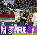 15.03.2025, Fussball 1. Bundesliga 2024/2025, 26. Spieltag, FC Augsburg - VfL Wolfsburg, in der WWK-Arena Augsburg, Steve Michel Mounie (FC Augsburg) gegen Denis Vavro (Wolfsburg) 