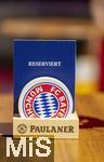 17.03.2025, Fussball, das FC Bayern Mnchen Legenden-Turnier FRANZ BECKENBAUER CUP, im SAP-Garden Mnchen. Auf einem Tisch steht RESERVIERT, mit FCB-Bierdeckel und Schriftzug des Brauerei-Sponsors PAULANER. 