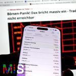 07.04.2025, Thema Brsenbeben nach dem Zoll-Streit aus Amerika: Tagesaktuelle Brsen-Daten auf einem iPhone16 Smartphone-Screen: Aktuelle Daten vom DAX zeigen massive Kursverluste am Montag 07. April 2025 aufgrund der Zlle von Prsident Trump in den USA.