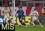 08.04.2025,  Fussball UEFA Championsleague 2024/2025: Viertelfinale Hinspiel, FC Bayern Mnchen - Inter Mailand, in der Allianz-Arena Mnchen. v.l. Min-jae Kim (Bayern Mnchen, Minjae Kim), Lautaro Martinez (Inter Mailand) und Raphael Guerreiro (FC Bayern Mnchen) 
  

