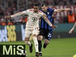 08.04.2025,  Fussball UEFA Championsleague 2024/2025: Viertelfinale Hinspiel, FC Bayern Mnchen - Inter Mailand, in der Allianz-Arena Mnchen. v.l. Michael Olise (FC Bayern Mnchen) gegen Henrikh Mkhitaryan (Inter Mailand) 
  

