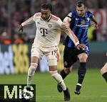 08.04.2025,  Fussball UEFA Championsleague 2024/2025: Viertelfinale Hinspiel, FC Bayern Mnchen - Inter Mailand, in der Allianz-Arena Mnchen. v.l. Michael Olise (FC Bayern Mnchen) gegen Henrikh Mkhitaryan (Inter Mailand) 
  

