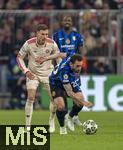 08.04.2025,  Fussball UEFA Championsleague 2024/2025: Viertelfinale Hinspiel, FC Bayern Mnchen - Inter Mailand, in der Allianz-Arena Mnchen. von links:  Leon Goretzka (FC Bayern Mnchen) gegen Hakan Calhanoglu (Inter Mailand) 