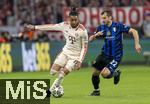 08.04.2025,  Fussball UEFA Championsleague 2024/2025: Viertelfinale Hinspiel, FC Bayern Mnchen - Inter Mailand, in der Allianz-Arena Mnchen. v.li: Michael Olise (FC Bayern Mnchen) gegen Henrikh Mkhitaryan (Inter Mailand) 