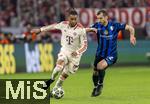 08.04.2025,  Fussball UEFA Championsleague 2024/2025: Viertelfinale Hinspiel, FC Bayern Mnchen - Inter Mailand, in der Allianz-Arena Mnchen. v.li: Michael Olise (FC Bayern Mnchen) gegen Henrikh Mkhitaryan (Inter Mailand) 