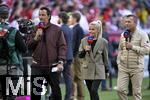12.04.2025, Fussball 1. Bundesliga 2024/2025, 29. Spieltag,  FC Bayern Mnchen - Borussia Dortmund, in der Allianz-Arena Mnchen. Sky Moderator Sebastian Hellmann , Sky Expertin Julia Simic, TV Experte Lothar Matthus (alle drei Deutschland)

