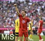 12.04.2025, Fussball 1. Bundesliga 2024/2025, 29. Spieltag,  FC Bayern Mnchen - Borussia Dortmund, in der Allianz-Arena Mnchen. Thomas Mller (FC Bayern Mnchen) schreit

