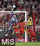 12.04.2025, Fussball 1. Bundesliga 2024/2025, 29. Spieltag,  FC Bayern Mnchen - Borussia Dortmund, in der Allianz-Arena Mnchen. v.l. Torwart Jonas Urbig (FC Bayern Mnchen) wehrt den Ball ab, Joshua Kimmich (FC Bayern Mnchen), Kingsley Coman (FC Bayern Mnchen), Emre Can (Borussia Dortmund) und Raphael Guerreiro (FC Bayern Mnchen)  

