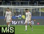 16.04.2025,  Fussball UEFA Championsleague 2024/2025: Viertelfinale Rckspiel, Inter Mailand - FC Bayern Mnchen, im Giuseppe Meazza Stadion (Mailand), v.l. Leon Goretzka (FC Bayern Mnchen) und Thomas Mller (FC Bayern Mnchen) nachdenklich

