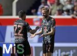 19.04.2025, Fussball 1. Bundesliga 2024/2025, 30. Spieltag, 1.FC Heidenheim - FC Bayern Mnchen, in der Voith-Arena Heidenheim. v.l. Raphael Guerreiro (FC Bayern Mnchen) und Konrad Laimer (FC Bayern Mnchen) jubeln

