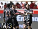19.04.2025, Fussball 1. Bundesliga 2024/2025, 30. Spieltag, 1.FC Heidenheim - FC Bayern Mnchen, in der Voith-Arena Heidenheim. v.l. Kingsley Coman (FC Bayern Mnchen), Joshua Kimmich (FC Bayern Mnchen), Aleksandar Pavlovic (Bayern Mnchen)  und Konrad Laimer (FC Bayern Mnchen) jubeln

