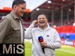 19.04.2025, Fussball 1. Bundesliga 2024/2025, 30. Spieltag, 1.FC Heidenheim - FC Bayern Mnchen, in der Voith-Arena Heidenheim. Sportvorstand Max Eberl (Bayern Mnchen) lachend beim SKY-Interview.