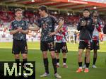 19.04.2025, Fussball 1. Bundesliga 2024/2025, 30. Spieltag, 1.FC Heidenheim - FC Bayern Mnchen, in der Voith-Arena Heidenheim. Schlussjubel nach dem Sieg, Joshua Kimmich (FC Bayern Mnchen), Thomas Mller (FC Bayern Mnchen), Min-jae Kim (Bayern Mnchen, Minjae Kim) 