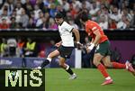 04.06.2025, Fussball UEFA Nations League 2024/25,  Halbfinale, Deutschland - Portugal, in der Allianz-Arena Mnchen. Aleksandar Pavlovic (Deutschland) setzt sich durch,