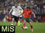 04.06.2025, Fussball UEFA Nations League 2024/25,  Halbfinale, Deutschland - Portugal, in der Allianz-Arena Mnchen. v.l. Nick Woltemade (Deutschland) gegen Ruben Dias (Portugal) 