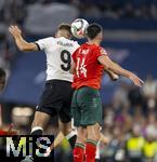 04.06.2025, Fussball UEFA Nations League 2024/25,  Halbfinale, Deutschland - Portugal, in der Allianz-Arena Mnchen. Kopfballzweikampf, v.li: Niclas Fllkrug (Deutschland), Goncalo Inacio (Portugal) 