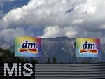 29.6.2025, Imst in Tirol, dm-Firmenschild vor dem Alpenkamm-Hintergrund. 