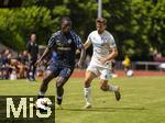 10.07.2025, Fussball 2. Bundesliga 2025/2026, Bad Wrishofen, 1.FC Magdeburg im Sommertrainingslager, Testspiel in Mindelheim (Unterallgu), FC Magdeburg - FC Zrich,  v.li: Umeh Emmanuel (Zrich) gegen Alexander Nollenberger (1. FC Magdeburg) 