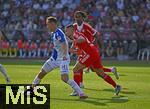 12.08.2025, Fussball Bundesliga 2025/2026, Freundschaftsspiel, Grasshopper Club Zrich - FC Bayern Mnchen - im Stadion am Letzigrund, Zrich (Schweiz). v.l. Lovro Zvonarek (Grasshopper Club Zrich) gegen Raphael Guerreiro (FC Bayern Mnchen) 