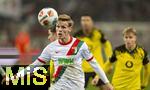 31.10.2025, Fussball 1. Bundesliga 2025/2026, 9.Spieltag, FC Augsburg - Borussia Dortmund, in der WWK-Arena Augsburg. v.li: Anton Kade (FC Augsburg) gegen Marcel Sabitzer (Borussia Dortmund) 
