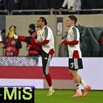 14.11.2025, Fussball WM-Qualifikation Europa 2025/26, 9.Spieltag,  Luxemburg - Deutschland, im Stade de Luxembourg (Croix de Gasperich, Luxemburg), v.l. Leroy Sane (Deutschland) und Florian Wirtz (Deutschland) wrmen sich auf.