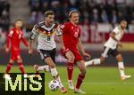 14.11.2025, Fussball WM-Qualifikation Europa 2025/26, 9.Spieltag,  Luxemburg - Deutschland, im Stade de Luxembourg (Croix de Gasperich, Luxemburg), v.li: Leon Goretzka (Deutschland) gegen Mathias Olesen (Luxemburg) 