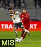 14.11.2025, Fussball WM-Qualifikation Europa 2025/26, 9.Spieltag,  Luxemburg - Deutschland, im Stade de Luxembourg (Croix de Gasperich, Luxemburg), v.li: Kevin Schade (Deutschland) gegen Daniel Sinani (Luxemburg) 