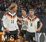 17.11.2025, Fussball WM-Qualifikation Europa 2025/26, 10.Spieltag,  Deutschland - Slowakei, in der Red-Bull-Arena Leipzig (Deutschland). v.l. Nick Woltemade (Deutschland), Joshua Kimmich (Deutschland) und Aleksandar Pavlovic (Deutschland) jubeln
