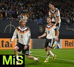 17.11.2025, Fussball WM-Qualifikation Europa 2025/26, 10.Spieltag,  Deutschland - Slowakei, in der Red-Bull-Arena Leipzig (Deutschland). Nick Woltemade (Deutschland) jubelt. v.l. Nick Woltemade (Deutschland), Joshua Kimmich (Deutschland) und Aleksandar Pavlovic (Deutschland) 