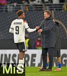 17.11.2025, Fussball WM-Qualifikation Europa 2025/26, 10.Spieltag,  Deutschland - Slowakei, in der Red-Bull-Arena Leipzig (Deutschland). National-Trainer Julian Nagelsmann (Deutschland) gratuliert Assan Ouedraogo (Deutschland) 