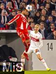 06.12.2025, Fussball Bundesliga 2025/2026, 13.Spieltag, VfB Stuttgart - FC Bayern M�nchen, in der MHP-Arena Stuttgart, Michael Olise (FC Bayern M�nchen) Kopfball. gegen Chris F�hrich (Stuttgart) 