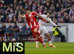06.12.2025, Fussball Bundesliga 2025/2026, 13.Spieltag, VfB Stuttgart - FC Bayern M�nchen, in der MHP-Arena Stuttgart, v.li: Min-jae Kim (Bayern M�nchen, Minjae Kim) gegen El Khannouss Bilal (Stuttgart) 