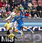 15.02.2026, Fussball 1. Bundesliga 2025/2026, 22.Spieltag, FC Augsburg - 1.FC Heidenheim, in der WWK-Arena Augsburg. v.li: Anton Kade (FC Augsburg) gegen Hennes Behrens (1.FC Heidenheim).