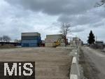 18.02.2026, M�nchen Trudering, Container-Lager auf einem Baugrund am Rappenweg. Ein tempor�res �bersee-Container-Depot in Trudering-Riem sorgt f�r unmut im Stadtrat. Eigentlich ist auf dem Gel�nde Wohnbebauung geplant, doch die Genehmigungen lassen auf sich warten, weshalb einige Eigent�mer ihre Fl�chen nun f�r Zwischennutzungen vermieten, mit unangenehmen Folgenwegen Schwerlastverkehr f�r die Anwohner. 